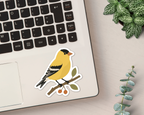 American Goldfinch vinyl sticker shown on a laptop
