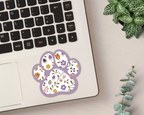Heather Floral Paw Print Sticker on a laptop