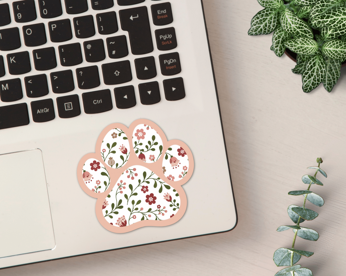Rose Garden Floral Paw Print Sticker on a laptop