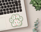 Sage Garden Floral Paw Print Sticker on a laptop